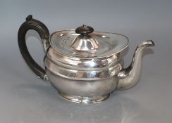 A George III silver teapot, London 1806, maker Soloman Hougham, gross 19 oz.