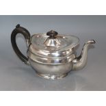 A George III silver teapot, London 1806, maker Soloman Hougham, gross 19 oz.