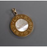 A Bulgari 18ct gold, steel and mother of pearl disc pendant (lacking necklace but in original