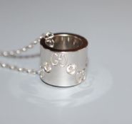 A modern Italian Gucci 18ct white gold and diamond set pendant, on a Gucci 18ct white gold chain.