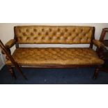 A Victorian snooker bench upholstered in buttoned leather W.168cm