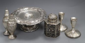 An American sterling tazza, a pair of sterling casters, a pair of sterling dwarf candlesticks and an