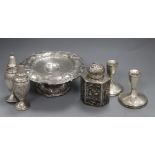 An American sterling tazza, a pair of sterling casters, a pair of sterling dwarf candlesticks and an