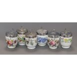 Eighteen Royal Worcester porcelain egg coddlers, including souvenir and commemorative examples