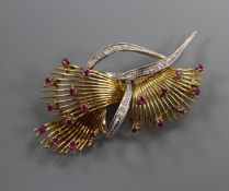 A 20th century Italian 750, ruby and diamond set stylised spray brooch, 56mm,.