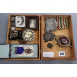 A collection of small items including tortoiseshell pique purse, a mother-of-pearl purse, enamel