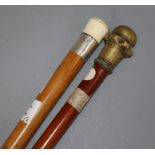 A bailiff's walking stick and sovereign case stick