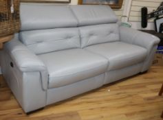 A pair of modern electrically operated grey leather upholstered two seater settees, the seating