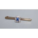 A yellow metal, sapphire and diamond square cluster set bar brooch, 46mm.