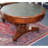 A Victorian oak drum table Diameter 105cm