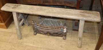 A 19th century provincial oak bench W.127cm