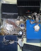 A collection of assorted wrist and pocket watches and watch keys.