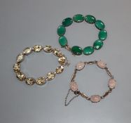 Three assorted white metal and gem set bracelets including rose quartz.