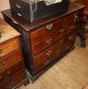 A George II walnut feather-banded chest fitted two short drawers and three graduated long drawers