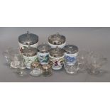 Six Royal Worcester large porcelain egg coddlers, eight smaller coddlers, two silver-topped