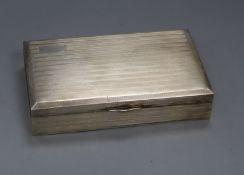 An Egyptian engine turned white metal cigarette box, 20cm.