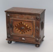 A small oak cabinet, possibly Welsh, c.1672? height 27.5cm