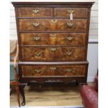 An 18th century walnut chest on stand W.94cm