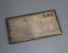 A George V engine turned silver cigarette case, Birmingham, 1922, 16.6cm, gross 10 oz.