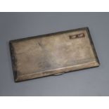 A George V engine turned silver cigarette case, Birmingham, 1922, 16.6cm, gross 10 oz.