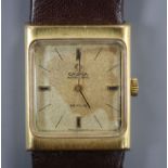 A lady's steel and gold plated Omega de Ville automatic wristwatch, on associated leather strap.