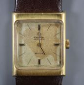 A lady's steel and gold plated Omega de Ville automatic wristwatch, on associated leather strap.