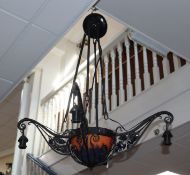 A Daum glass and cast iron four branch ceiling light, 49cm wide