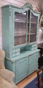 A 19th century continental painted pine glazed cabinet W.126cm