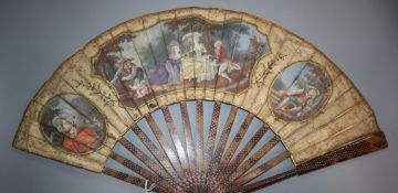 An 18th century French painted silk fan, tortoiseshell and pique work sticks