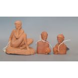 A terracotta model of a seated nude by Eric Griffiths and two similar double busts