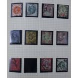 A collection of stamp albums containing Victorian British and Inland Revenue stamps