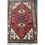 A Caucasian design rug 150 x 100cm