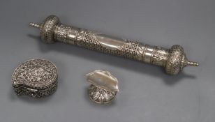 An Indian pierced white metal scroll case on stand and an Indian white metal kidney shaped box,
