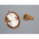 A Victorian gem set 'knot' brooch and a 750 mounted oval cameo pendant brooch.