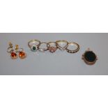 Two 18ct gold gem set rings including diamond, three 9ct gold and gem set rings, a gold fob and pair