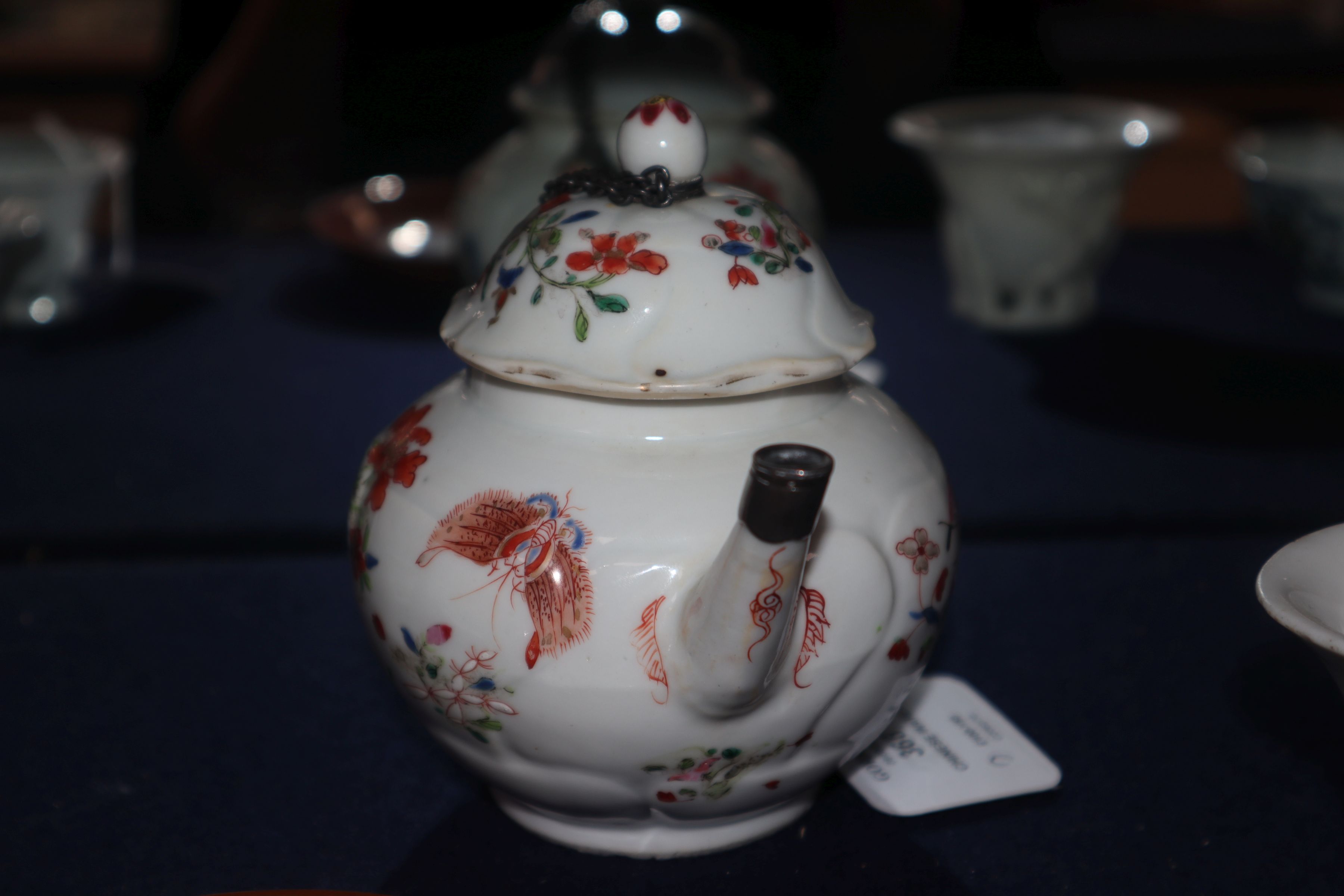 A Chinese famille rose teapot and cover, Qianlong, metal repair to spout, and a Batavia saucer - Image 5 of 9