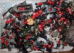 A collection of Johillco painted toy soldiers, a Chad Valley clockwork set, tin plate etc