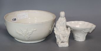 A Chinese blanc de chine bowl, figure and libation cup, 18th / 19th century