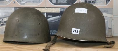 Two American army helmets
