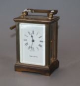 A Mappin and Webb brass carriage timepiece