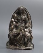 A silver and plated Holy family group