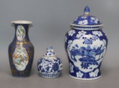 A Chinese gilt decorated powder blue vase, 19th century and two 19th century blue and white jars and