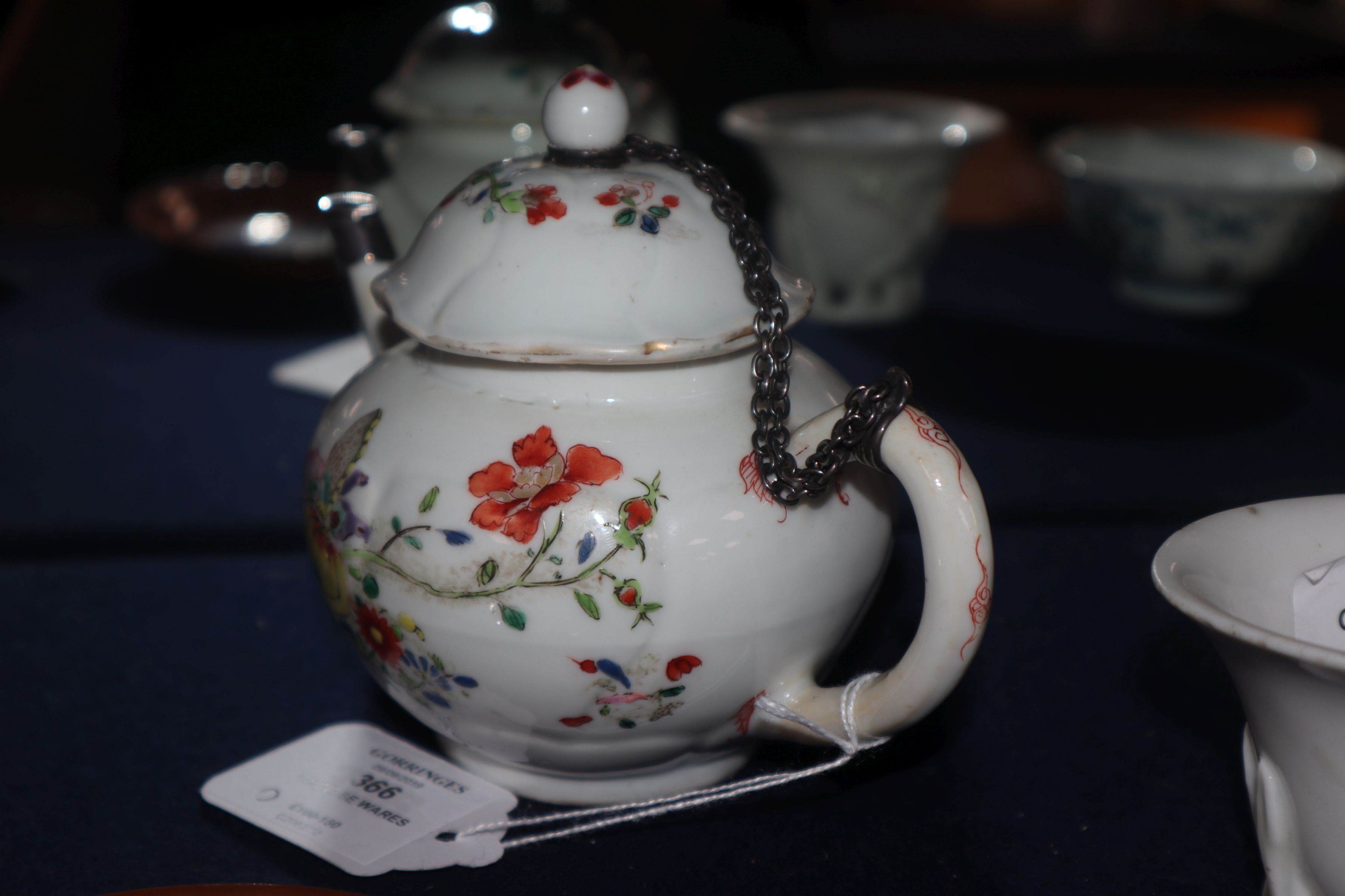 A Chinese famille rose teapot and cover, Qianlong, metal repair to spout, and a Batavia saucer - Image 7 of 9