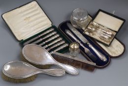 A case Victorian silver knife and fork, two other cased sets including Danish spoons and five