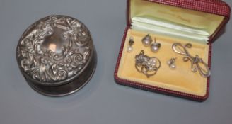 A Mikimoto cultured pearl brooch, two pairs of cultured pearl earrings, a silver trinket box and two