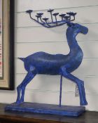 A large painted novelty stag candlestick
