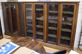 A Victorian oak glazed double bookcase and a single bookcase ensuite Larger approx. W.200cm