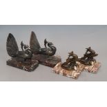 A pair of peacock bookends and similar deer bookends