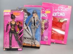 Barbie: Cat Woman and Sinatra Barbie plus two outfits