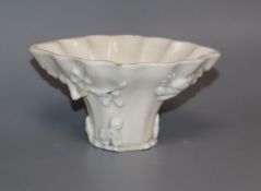 A Chinese blanc de chine 'dragon' libation cup